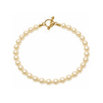 Pulsera de perla crema 6 mm sobre fondo blanco