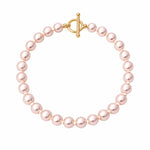 Pulsera de perla rosa pastel 8 mm sobre fondo blanco