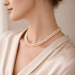 Perfil mostrando doble hilo de perla crema