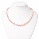 Collar de perla rosa pastel 8 mm en cuello exhibidor