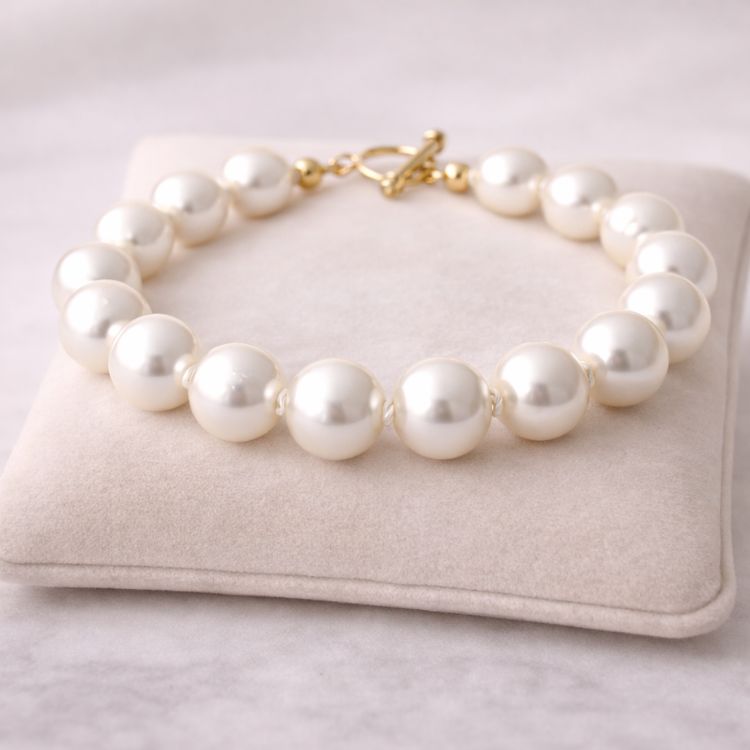 Pulsera de perla blanca 12 mm en exhibidor