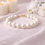 Pulsera de perla blanca de mayor tamaño en composición