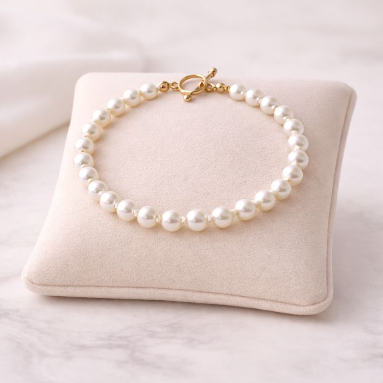 Pulsera de perla blanca 6 mm en exhibidor