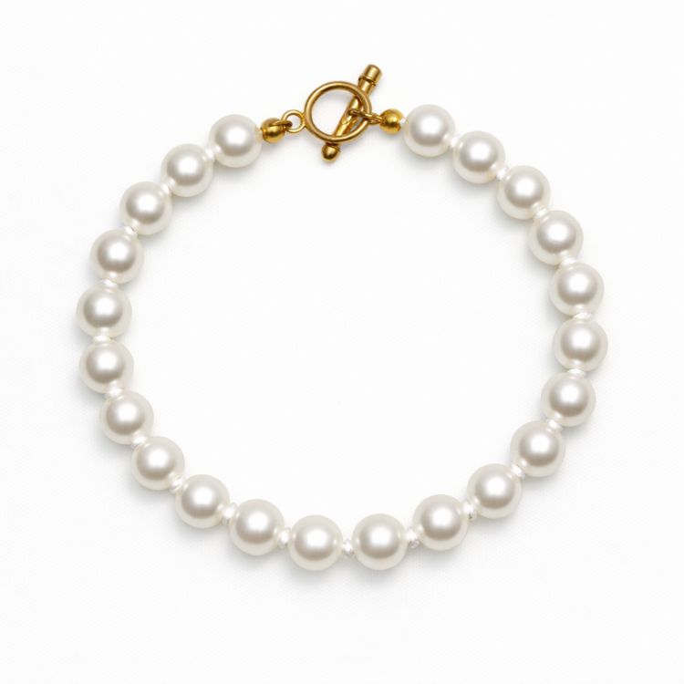 Pulsera de perla blanca 8 mm sobre fondo blanco