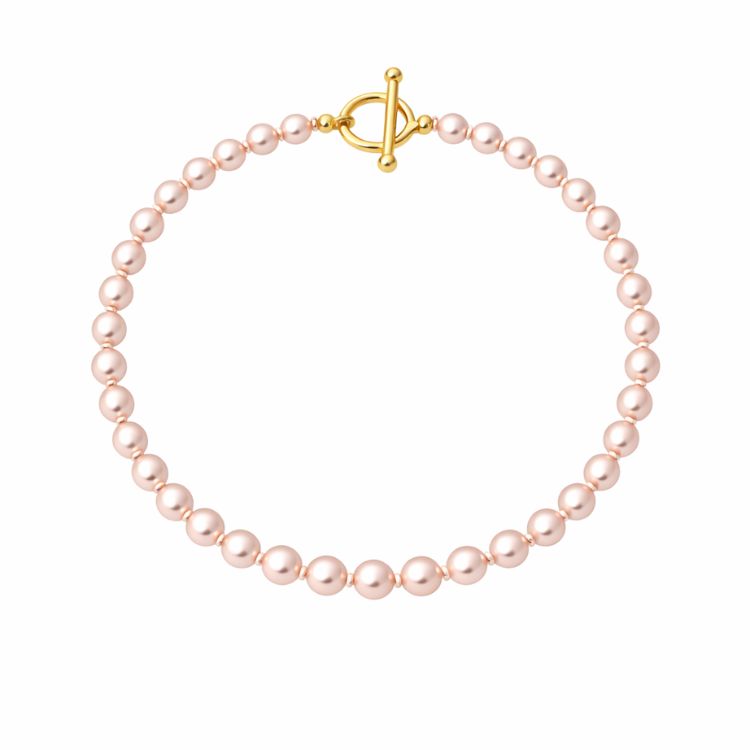 Pulsera de perla rosa pastel 6 mm sobre fondo blanco