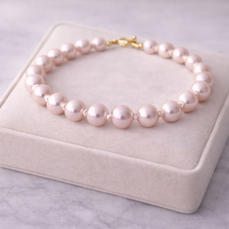Pulsera de perla rosa pastel 8 mm en exhibidor